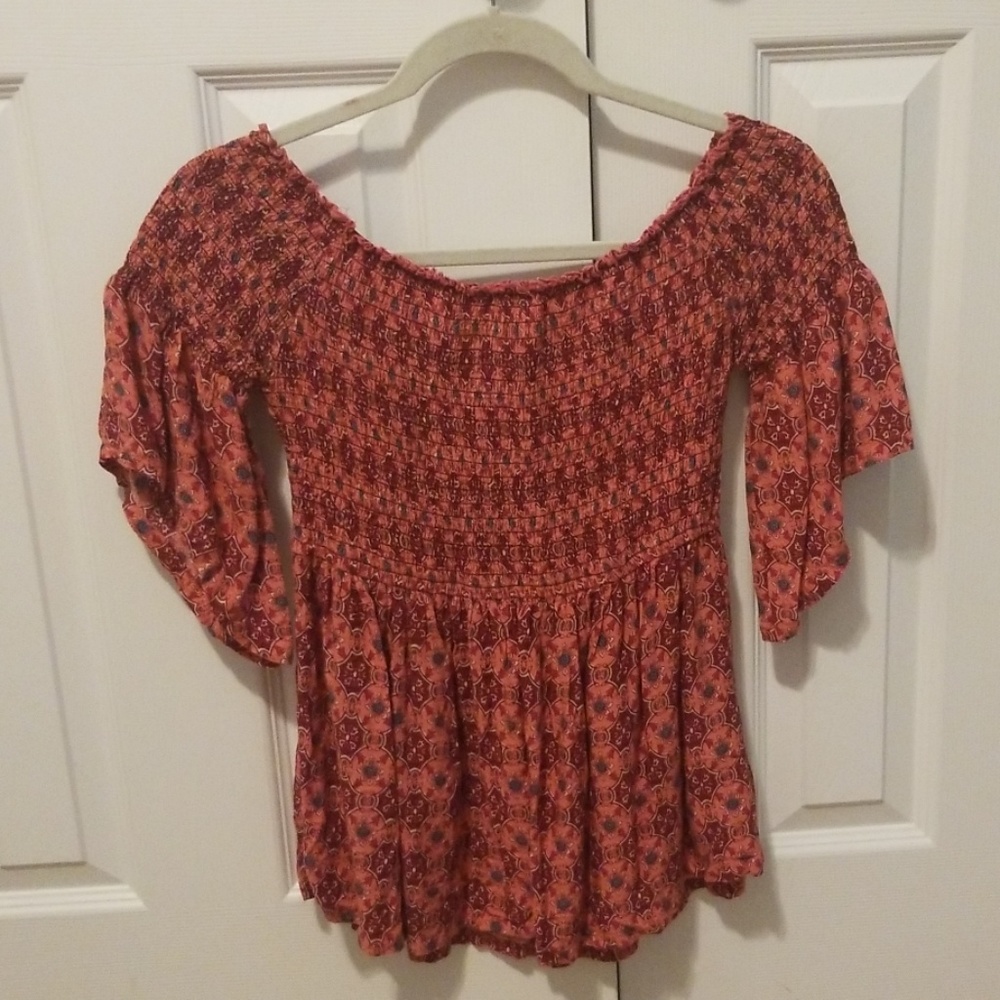 And oof the shoulder shirt